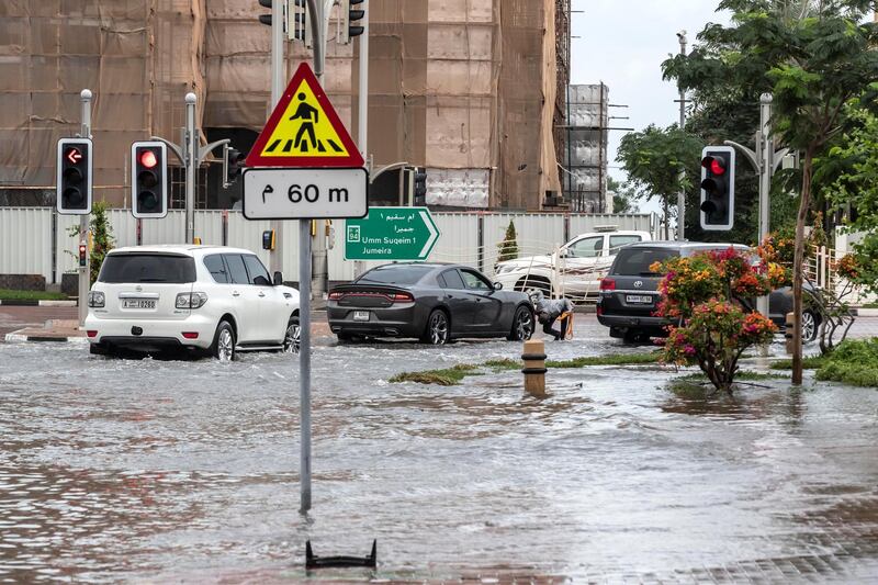 DUBAI, UNITED ARAB EMIRATES. 11 JANUARY 2020. Heavy rains in Dubai during the night caused extensive flooding at intersections within the city. Commuters battle high water along the Al Manara and Beach road intersection. (Photo: Antonie Robertson/The National) Journalist: Standalone. Section: National.


