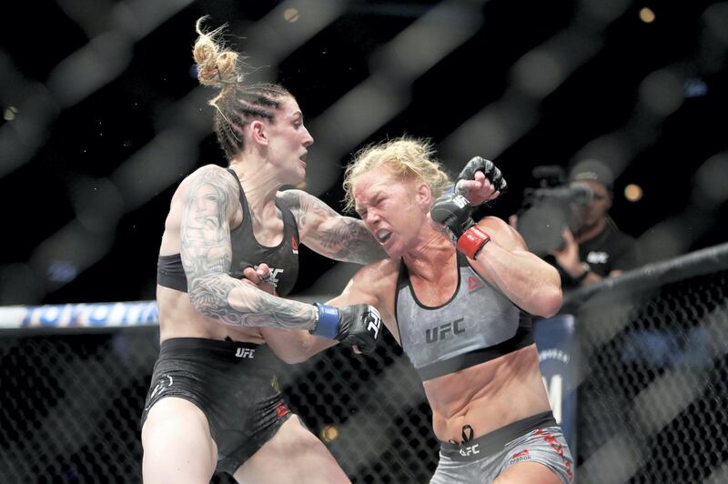 CHICAGO, IL - JUNE 09: Holly Holm (L) punches Megan Anderson of Australia (L) in the fifth round in their featherweight bout during the UFC 225: Whittaker v Romero 2 event at the United Center on June 9, 2018 in Chicago, Illinois. Holm won by unanimous decision.   Dylan Buell/Getty Images/AFP