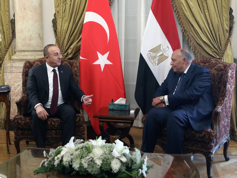 Egyptian Foreign Minister Sameh Shoukry, right, meets Turkish Foreign Minister Mevlut Cavusoglu at the Ministry of Foreign Affairs in Cairo on March 18. EPA