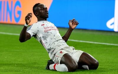 MUNICH, GERMANY - MARCH 13: Sadio MAne of Liverpool celebrates after scoring his first goal during the UEFA Champions League Round of 16 Second Leg match between FC Bayern Muenchen and Liverpool at Allianz Arena on March 13, 2019 in Munich, Bavaria. (Photo by Lars Baron/Bongarts/Getty Images)