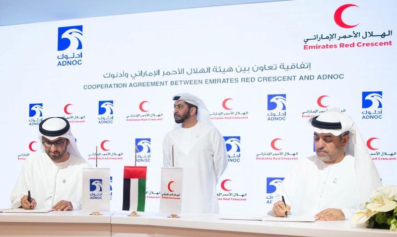 The Adnoc Group and Emirates Red Crescent sign a partnership agreement. Courtesy Adnoc