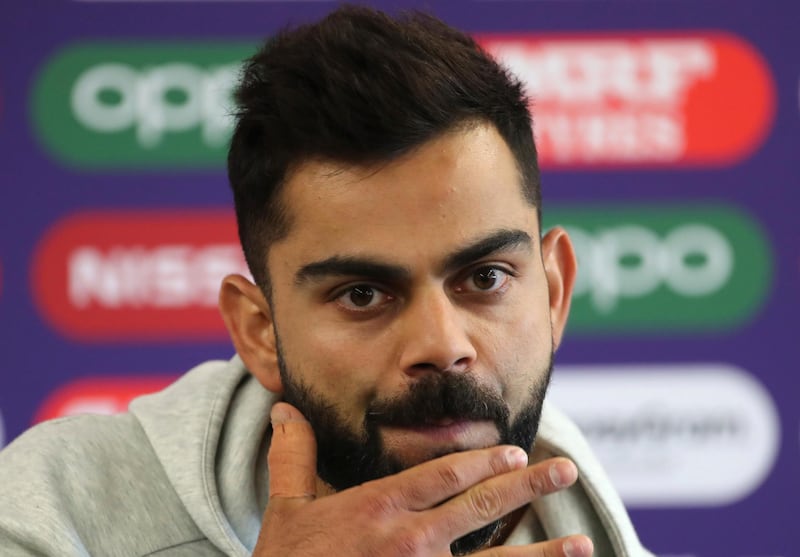 India's captain Virat Kohli reacts during a press conference after attending a training session ahead of their Cricket World Cup match against Pakistan at Old Trafford in Manchester, England, Saturday, June 15, 2019. (AP Photo/Aijaz Rahi)
