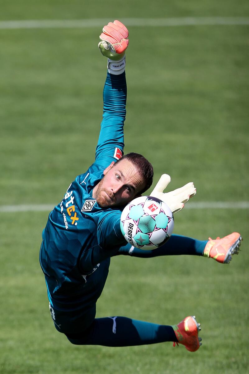 Borussia Monchengladbach goalkeeper Tobias Sippel makes a save during the Bundesliga club's first training session after a summer break on Tuesday, August 4. Getty