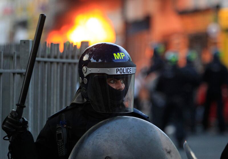 British police officers are deployed during riots in Hackney, east London, Monday Aug. 8, 2011. Youths set fire to shops and vehicles in a host of areas of London _ which will host next summer's Olympic Games _ and clashed with police in the nation's central city of Birmingham, as authorities struggled to halt groups of rampaging young people. (AP Photo/Lefteris Pitarakis) *** Local Caption ***  Britain Riots.JPEG-0c452.jpg