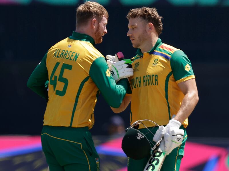 South Africa batters Heinrich Klaasen, left, and David Miller celebrate after beating Sri Lanka by six wickets in the T20 World Cup match at the Nassau County International Cricket Stadium in Westbury, New York, on June 3, 2024. AP