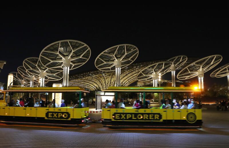 Visitors enjoying the ride in the Expo Explorer train. Pawan Singh/The National.