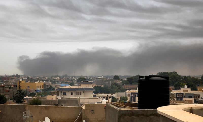 Smoke rises after an airstrike launched by Khalifa Haftar forces on military camps in Tajoura area, east of Tripoli, Libya. Reuters