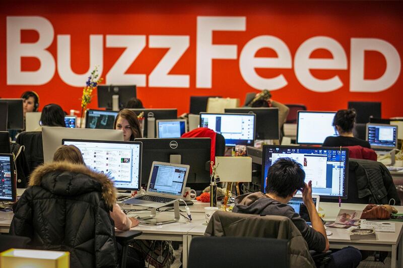 Buzzfeed employees work at the company's headquarters in New York January 9, 2014.   REUTERS/Brendan McDermid/File Photo