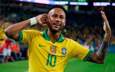 TOPSHOT - Brazil's foward Neymar Jr. celebrates after scoring against Colombia during their international friendly football match between Brazil and Colombia at Hard Rock Stadium in Miami, Florida, on September 6, 2019. / AFP / RHONA WISE                      
