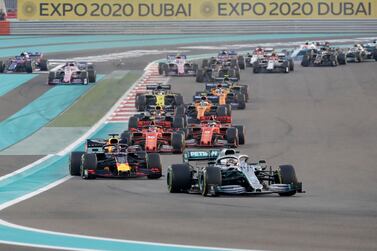 Mercedes driver Lewis Hamilton of Britain leads the pack on during the Emirates Formula One Grand Prix, at the Yas Marina racetrack in Abu Dhabi, United Arab Emirates, Sunday, Dec.1, 2019. (AP Photo/Luca Bruno)