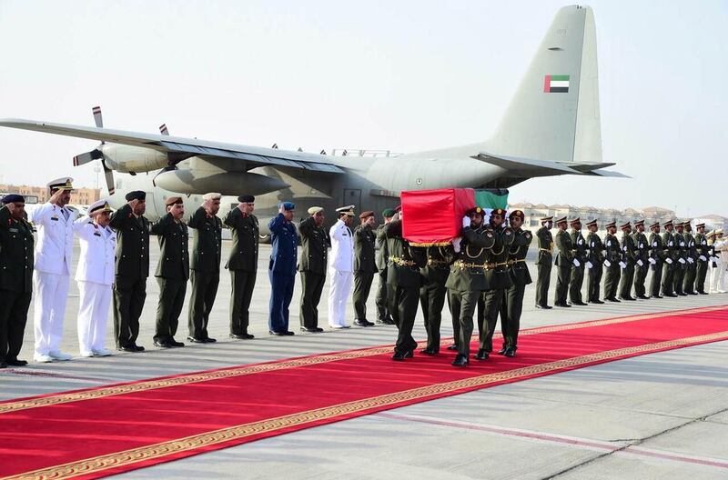 The arrival of the body of the martyr Saif Al Falasi to Al Bateen airport in Abu Dhabi. Wam