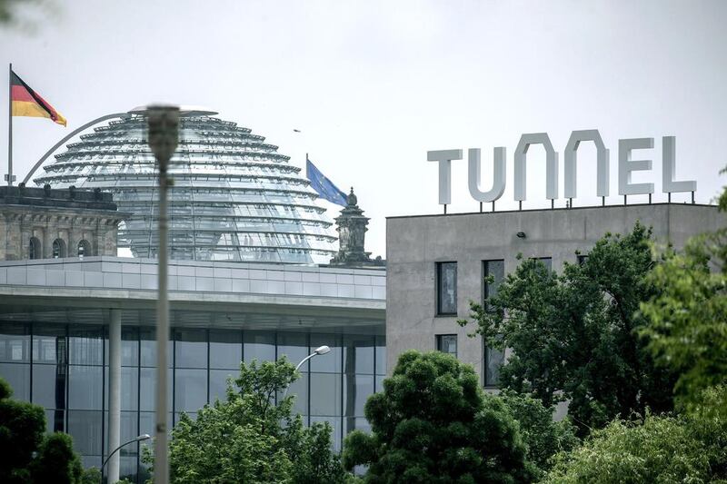 To mark the tunnel opening, huge letters reading "Tunnel" were erected on the embassy of Switzerland in Berlin, Germany. Michael Kappeler / EPA