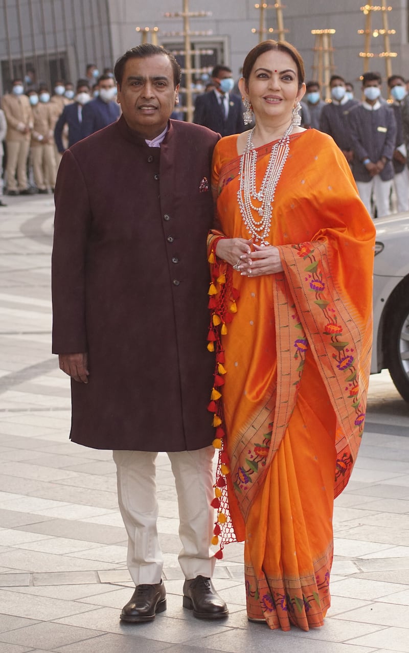 Mukesh and Nita Ambani attend an arangetram (debut classical Indian dance) ceremony in June in Mumbai. Getty Images