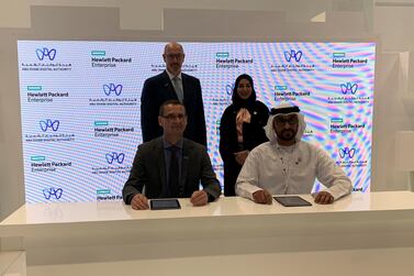 (sitting from L) Wolfgang Egger, vice president and managing director of HPE Middle East and South Africa, and Abdulla Al Kendi, executive director, technology and policies at ADDA, during the pact signing on Tuesday. Courtesy ADDA