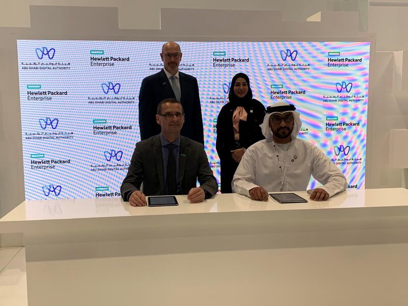 (sitting from L) Wolfgang Egger, vice president and managing director of HPE Middle East and South Africa, and Abdulla Al Kendi, executive director, technology and policies at ADDA, during the pact signing on Tuesday. Courtesy ADDA