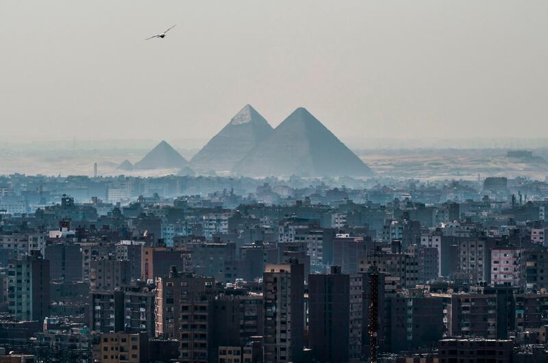 TOPSHOT - A picture taken on February 28, 2018 shows a view of the Pyramids of Giza on the southwestern outskirts of the Egyptian capital Cairo. / AFP PHOTO / KHALED DESOUKI