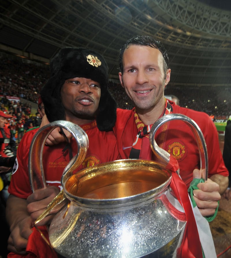 Giggs and Patrice Evra of Manchester United hold the trophy after winning the UEFA Champions League Final in Moscow in May 2008. Getty Images