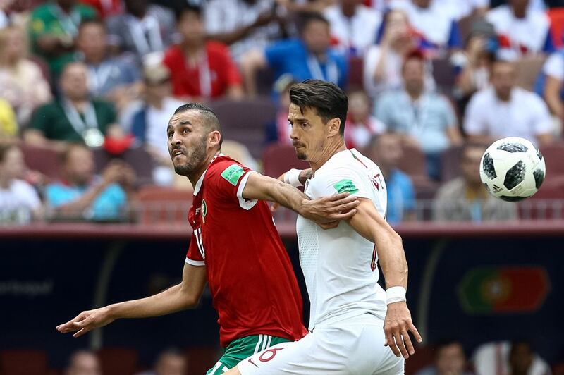epa06824395 Jose Fonte (R) of Portugal in action against Khalib Boutaib (L) of Morocco during the FIFA World Cup 2018 group B preliminary round soccer match between Portugal and Morocco in Moscow, Russia, 20 June 2018.

(RESTRICTIONS APPLY: Editorial Use Only, not used in association with any commercial entity - Images must not be used in any form of alert service or push service of any kind including via mobile alert services, downloads to mobile devices or MMS messaging - Images must appear as still images and must not emulate match action video footage - No alteration is made to, and no text or image is superimposed over, any published image which: (a) intentionally obscures or removes a sponsor identification image; or (b) adds or overlays the commercial identification of any third party which is not officially associated with the FIFA World Cup)  EPA/PAULO NOVAIS EDITORIAL USE ONLY  EDITORIAL USE ONLY