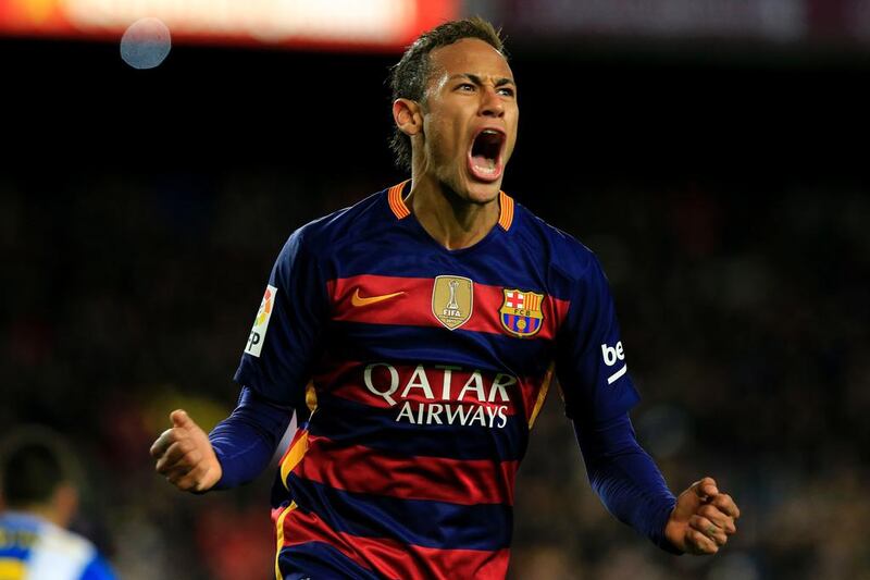 Barcelona’s Brazilian forward Neymar celebrates after scoring during the Spanish Copa del Rey (King’s Cup) round of 16 first leg football match FC Barcelona vs RCD Espanyol at the Camp Nou stadium in Barcelona on January 6, 2016.   AFP PHOTO/ PAU BARRENA / AFP / PAU BARRENA