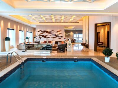 Elite Residence penthouse boasts a swimming pool in the middle of the living room. Photo: Luxhabitat Sotheby's International Realty