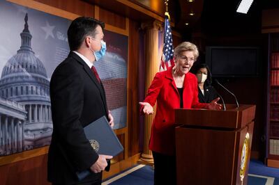 epa09045359 Democratic Senator from Massachusetts Elizabeth Warren (C) participates in a news conference with Democratic Representative from Washington Pramila Jayapal (R) and Democratic Representative from Pennsylvania Brendan Boyle (L), to introduce the 'Ultra-Millionaire Tax Act', on Capitol Hill in Washington, DC, USA, 01 March 2021. The measure would hike the taxes of the extremely wealthy in an attempt to create revenue to offset income disparities and lost federal funds due to the coronavirus COVID-19 pandemic.  EPA/MICHAEL REYNOLDS