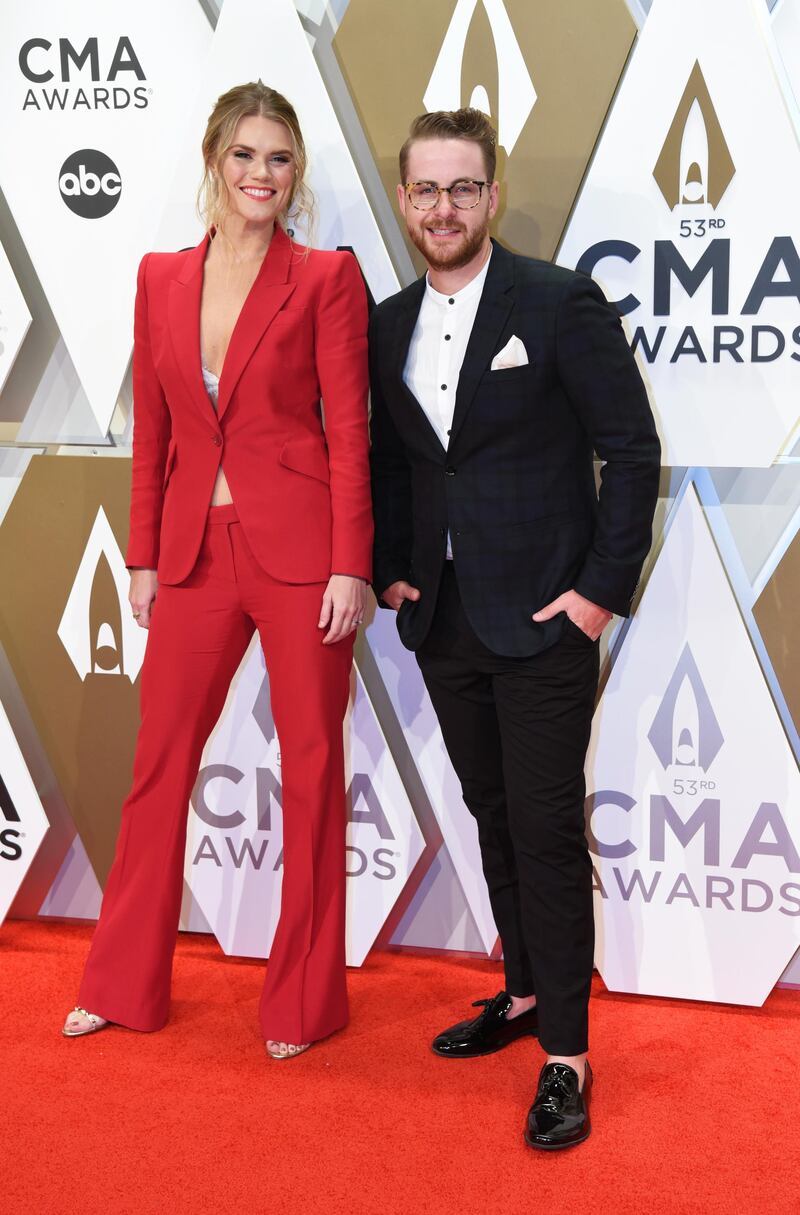 Nicolle Galyon and Jordan Reynolds arrive at the 53rd annual CMA Awards in Nashville on November 13, 2019. Reuters