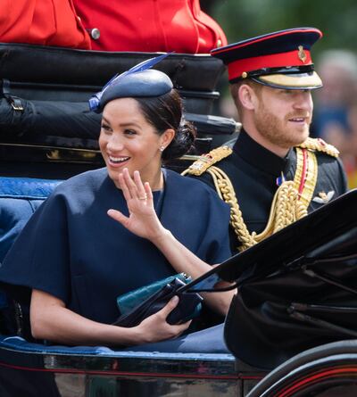 LONDON, ENGLAND - JUNE 08: Prince Harry, Duke of Sussex and Meghan, Duchess of Sussex ride by carriage down the Mall during Trooping The Colour, the Queen's annual birthday parade, on June 08, 2019 in London, England. (Photo by Samir Hussein/Samir Hussein/WireImage/Getty Images)