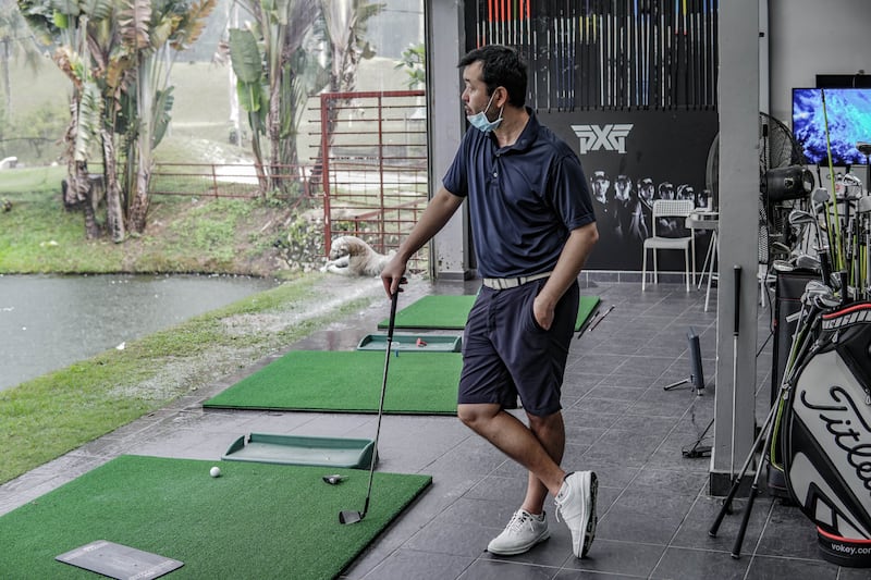Impact Golf boss Eric Chong in the club fitting studio. Photo: Impact Golf