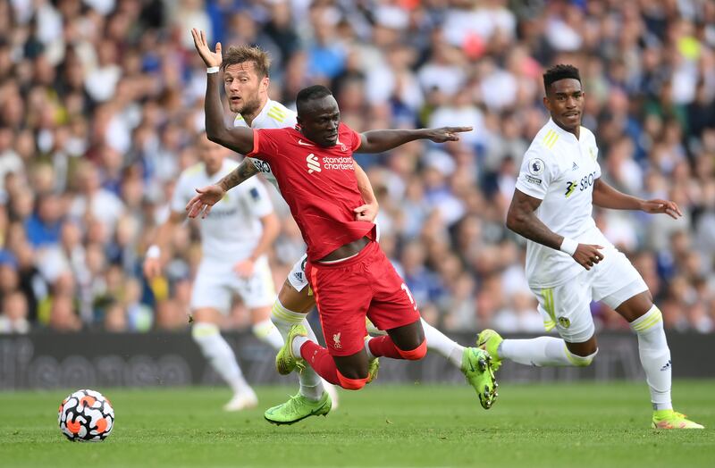 Liverpool's Sadio Mane is fouled by Liam Cooper of Leeds. Getty