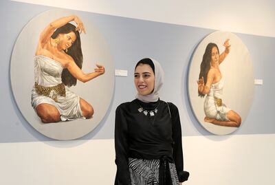 Sara Tantawy with her artwork at Fann A Porter in Dubai. Pawan Singh / The National