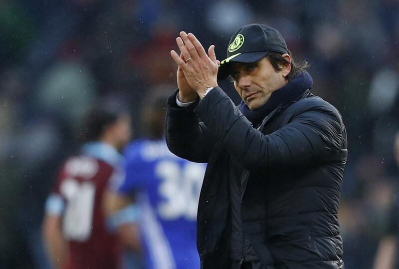 Chelsea manager Antonio Conte applauds fans after the game. Phil Noble / Reuters