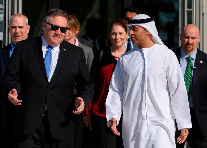 US Secretary of State Mike Pompeo (L) speaks with the Emirati Ambassador to the US Yousef Al Otaiba at the NYU Abu Dhabi campus in Abu Dhabi on January 13, 2019.  / AFP / POOL / ANDREW CABALLERO-REYNOLDS
