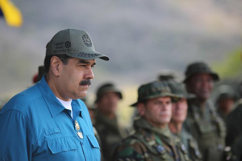 epa07341098 A handout picture provided by the Miraflores press office that shows Venezuelan President Nicolas Maduro (C) during an event with members of the military, in Turiamo, Venezuela, 03 February 2019, where he asked the troops to take care of the 'union' and 'loyalty' to the National Amerd Forces.  EPA/PRENSA MIRAFLORES HANDOUT  HANDOUT EDITORIAL USE ONLY/NO SALES