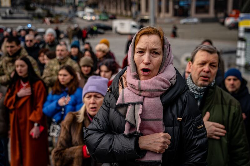 Hundreds of mourners packed a Kyiv church for the funeral of volunteers killed during a sabotage mission in Russia. AFP