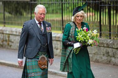 Britain's Prince Charles, Prince of Wales and Britain's Camilla, Duchess of Cornwall arrive to take part in a 2 minute silence to mark the 75th anniversary of VE Day AFP