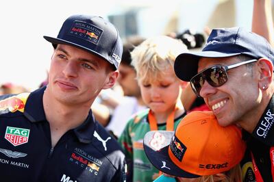 ABU DHABI, UNITED ARAB EMIRATES - NOVEMBER 23:  Max Verstappen of Netherlands and Red Bull Racing poses for a photo with fans before practice for the Abu Dhabi Formula One Grand Prix at Yas Marina Circuit on November 23, 2018 in Abu Dhabi, United Arab Emirates.  (Photo by Mark Thompson/Getty Images)