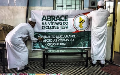 Volunteers of the Muslim movement to support the victims of Cyclone Idai put up a banner at their community centre in Maputo, Mozambique, March 23, 2019. Jack Moore / The National 