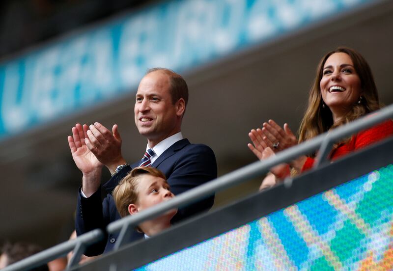 Prince William, Duke of Cambridge, left, and Catherine, Duchess of Cambridge clap at the end of the Euro 2020 soccer match round of 16 between England and Germany at Wembley stadium.