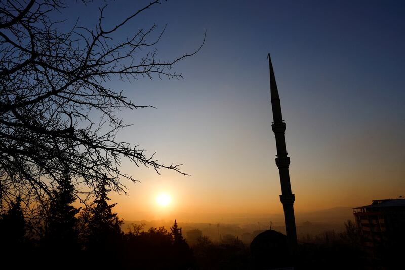 A minaret stands as the sun rises over the earthquake-hit city of Kahramanmaras, Turkey. Reuters