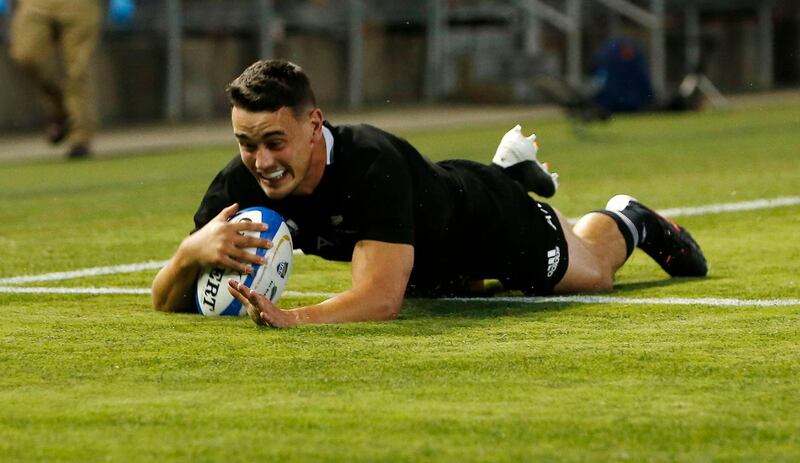 Will Jordan scores his second  try for New Zealand. EPA