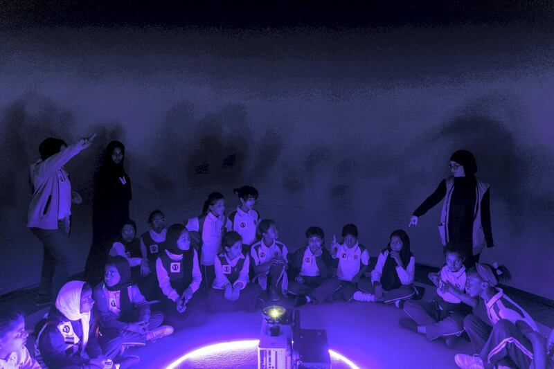 ABU DHABI, UNITED ARAB EMIRATES - JANUARY 31, 2019.

Female students at a planetarium in Abu Dhabi Science Festival at the corniche in Abu Dhabi.

The event focuses on STEAM subjects (science, technology, engineering, arts and mathematics). Around 200 innovators are displaying their projects at the three host venues over 10 days.

(Photo by Reem Mohammed/The National)

Reporter: GILLIAN DUNCAN
Section:  NA