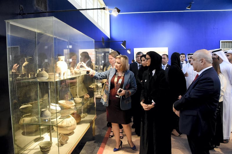 An Iraq Museum official points out exhibits to the UAE Minister of Culture and Knowledge Development Noura Al Kaabi during a tour on April 23, 2018. Wam