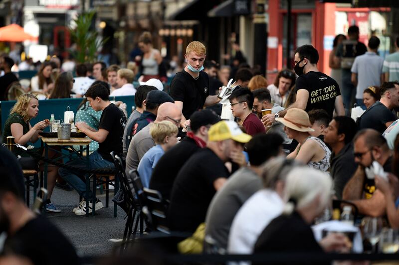 Britain's economy rebounded in the second quarter after more people dined out as restrictions eased, while education and health care also boosted output. AFP