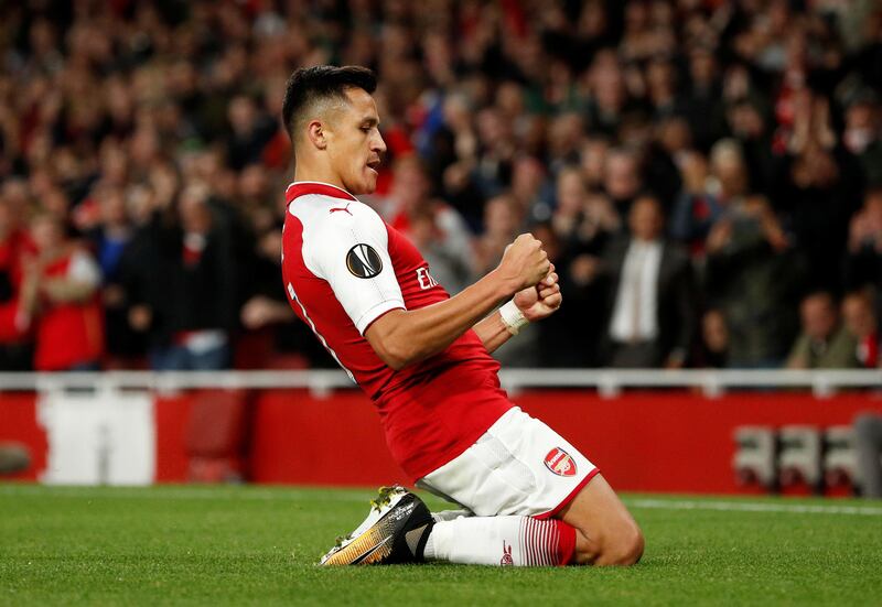 Arsenal's Alexis Sanchez celebrates scoring his team's second goal. John Sibley / Reuters