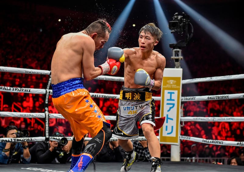 Naoya Inoue of Japan (R) and Nonito Donaire of Philippines fight in their World Boxing Super Series bantamweight final at Saitama Super Arena in Saitama on November 7, 2019.   / AFP / Kazuhiro NOGI
