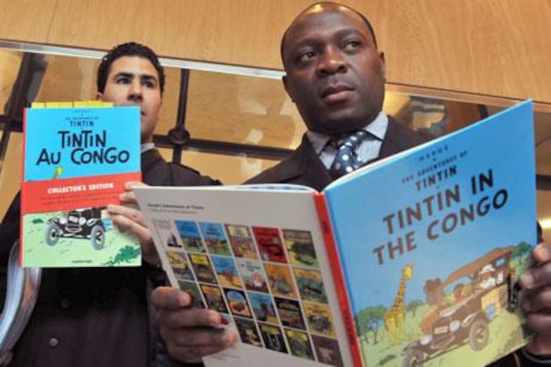 Bienvenu Mbutu Mondondo, right, tried last year to get the book Tintin in the Congo taken off shelves.