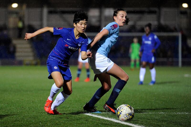 KINGSTON UPON THAMES, ENGLAND - FEBRUARY 06: Ji So-Yun of Chelsea runs past Caroline Weir of Manchester City during the FA Continental Tyres Cup Semi Final match between Chelsea Women and Manchester City Women at The Cherry Red Records Stadium on February 06, 2019 in Kingston upon Thames, England. (Photo by Alex Burstow/Getty Images)