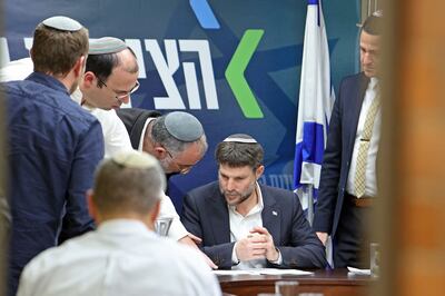 Israel's Finance Minister and leader of the Religious Zionist Party Bezalel Smotrich attends a meeting at the parliament, Knesset, in Jerusalem on Monday. AFP