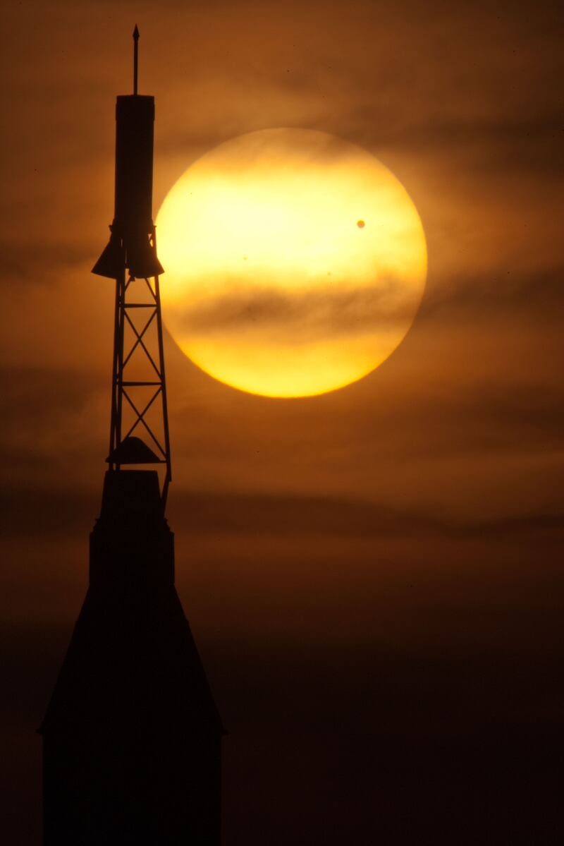 The June 5, 2012 transit of Venus, the small dot in the upper right of the disk, was captured by a Johnson Space Centre photographer in Rocket Park, Texas.