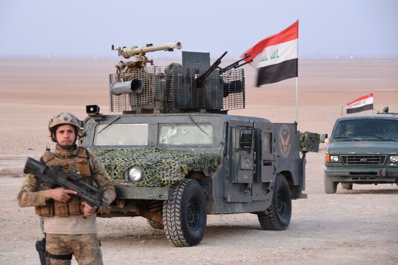 Iraqi rapid intervention forces advance as they take part in an operation against Islamic State (IS) group jihadists east of Tuz Khurmatu on February 7, 2018.

 

The army, rapid intervention forces and paramilitaries, in coordination with Kurdish fighters and with Iraqi and coalition air cover, launched the operation "to chase away IS remnants," said Iraq's Security Information Centre. / AFP PHOTO / Mahmud SALEH